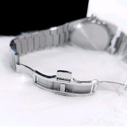 Silver watch on a white background